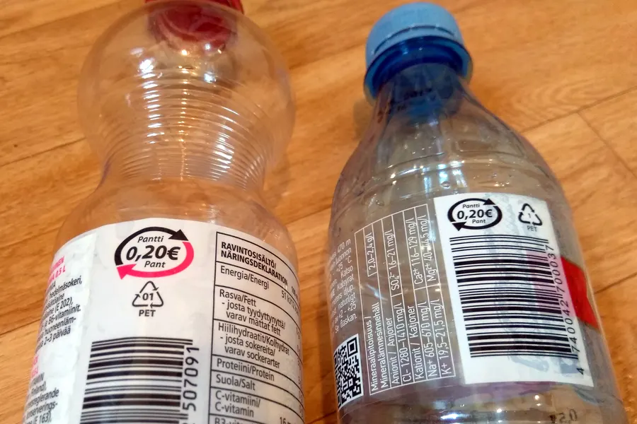 Clear PET drinking bottles marked with resin code 1